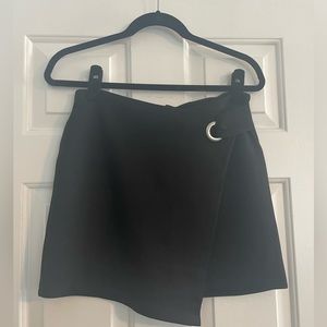 Faux suede black cross-over mini skirt